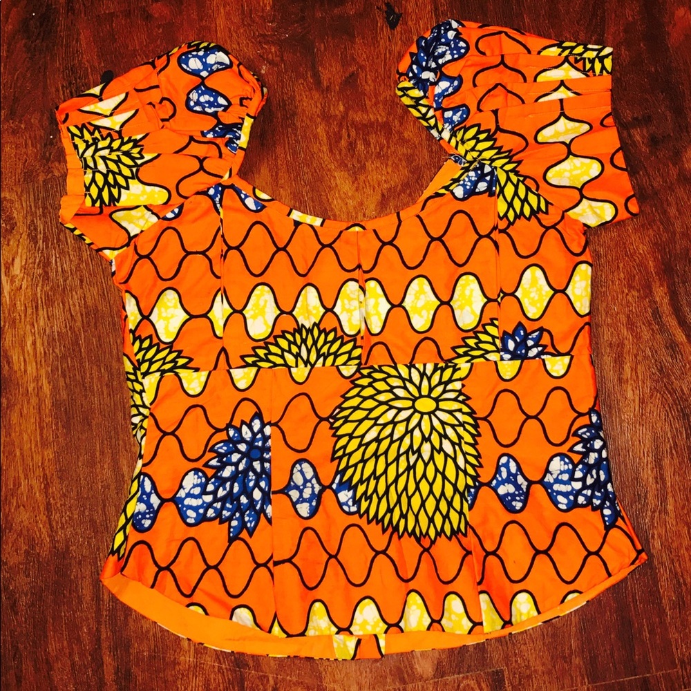 One of a Kind African Print shouldered flare top